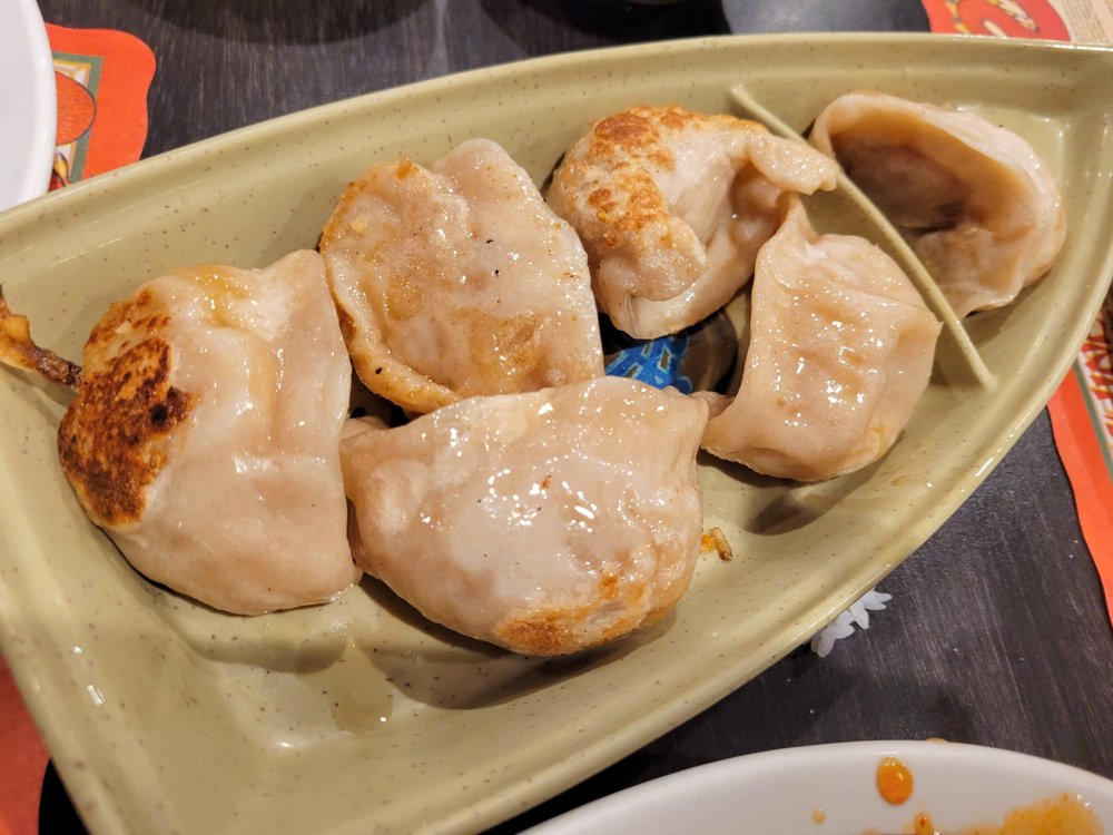 Order Pot Stickers (6) food online from Eric's Restaurant store, San Francisco on bringmethat.com