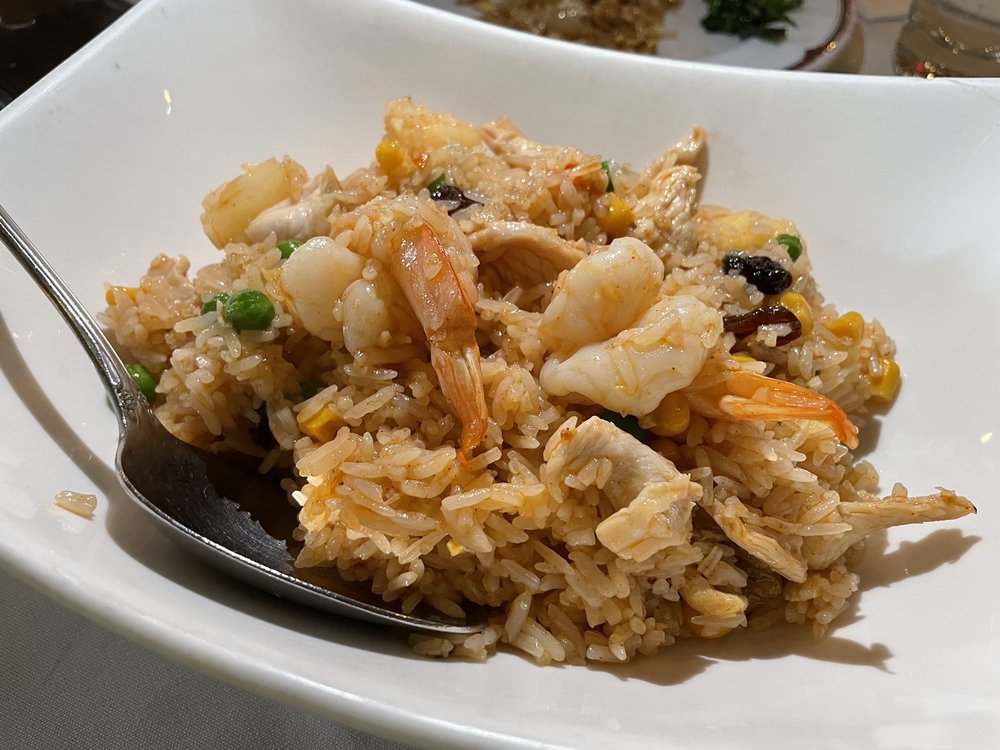 Order 33. Kao Pad Sapparod (House Special) - Pineapple Fried Rice food online from New Krung Thai store, San Jose on bringmethat.com