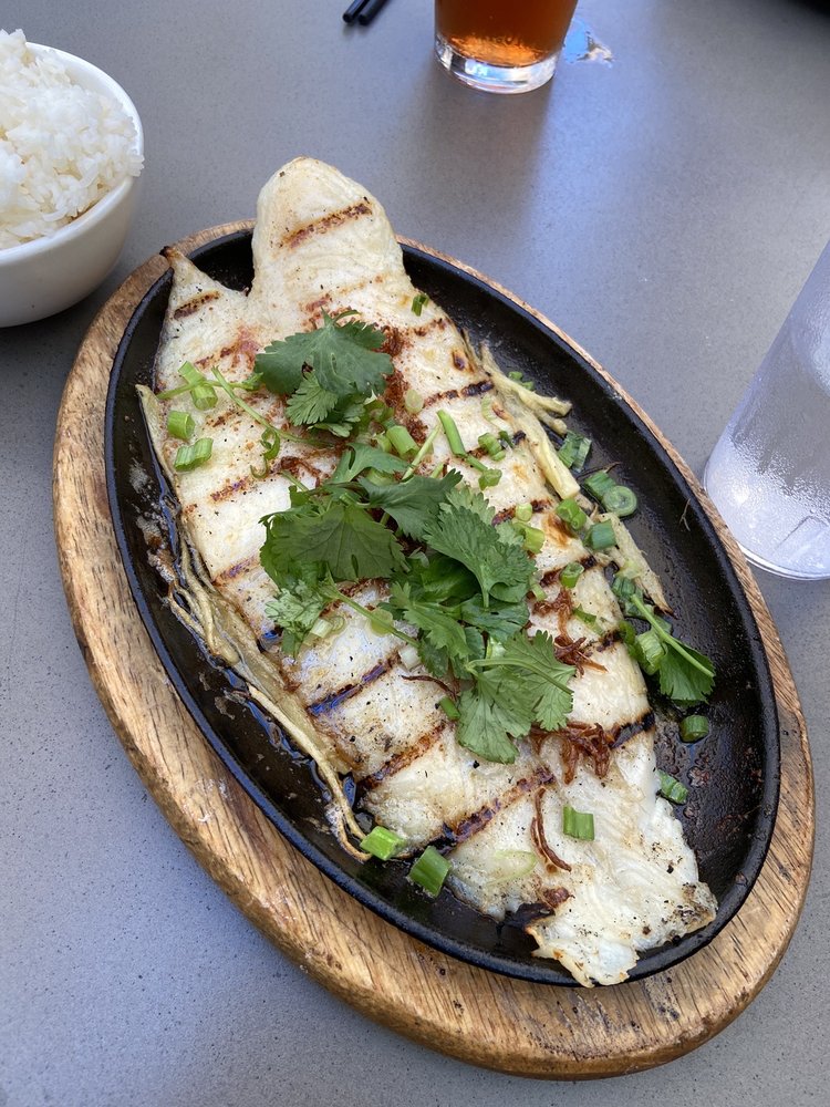 Order 46. SIZZLING FISH food online from OB Noodle House store, San Diego on bringmethat.com