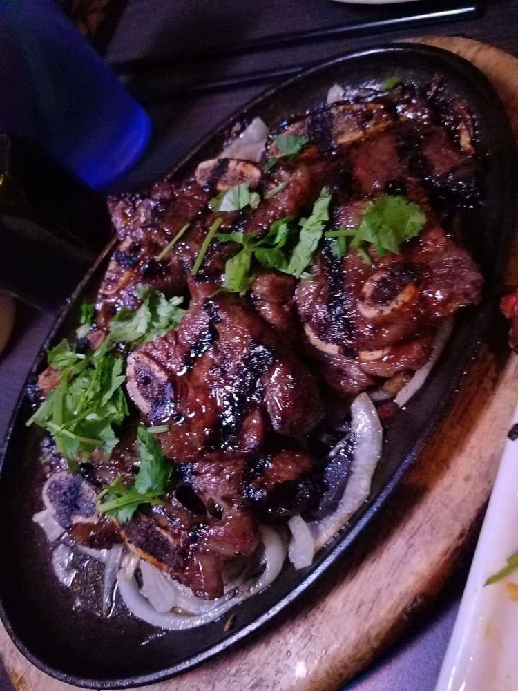 Order 45. KOREAN BEEF SHORT RIBS food online from OB Noodle House store, San Diego on bringmethat.com