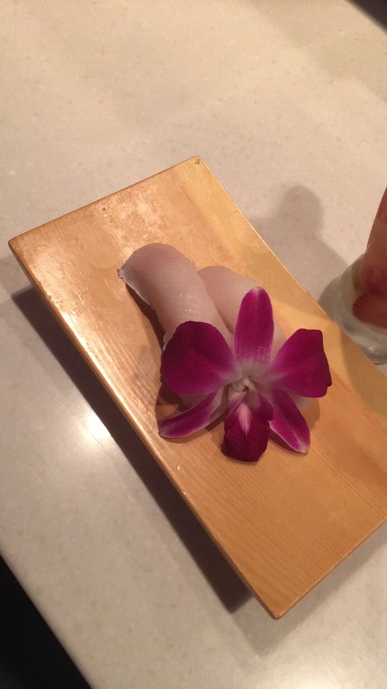 Order Hamachi Nigiri food online from Arigato Sushi store, Sacramento on bringmethat.com