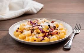 Order Gnocchi Zafferano food online from La-Parolaccia Osteria Italiana store, Long Beach on bringmethat.com