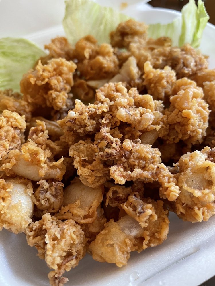 Order 34. CHICHARRON DE CALAMARES food online from Mario's Peruvian & Seafood store, Los Angeles on bringmethat.com