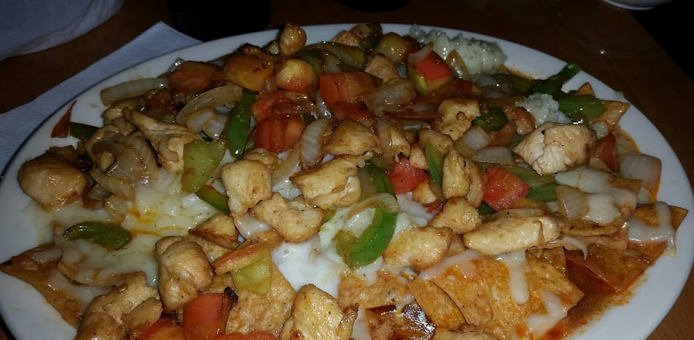 Order Chilaquiles with Guisada or Carnitas food online from New Mecca Cafe store, Pittsburg on bringmethat.com