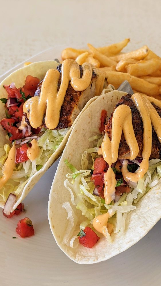 Order Fresh Mahi Tacos food online from Guppy's On the Beach store, Indian Rocks Beach on bringmethat.com