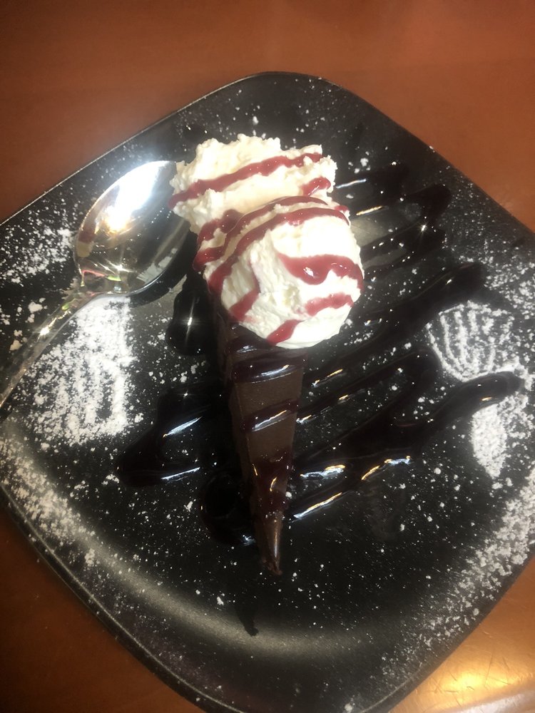 Order Flourless Chocolate Torte food online from Guppy's On the Beach store, Indian Rocks Beach on bringmethat.com