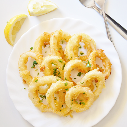 Order Fried Calamari food online from Panama Hatties store, St. Augustine on bringmethat.com