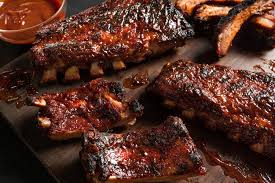 Order Grilled Baby Back Pork Rib Dinner food online from Tommy Bahama Restaurant, Bar & Store store, Sarasota on bringmethat.com