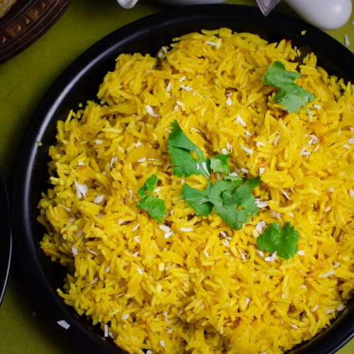 Order Yellow Rice  food online from Shorty's Bar-b-q store, Doral on bringmethat.com
