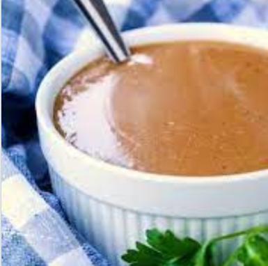 Order Side Brown Gravy food online from Highway Inn Restaurant, Catering and Seafood store, Waipahu on bringmethat.com