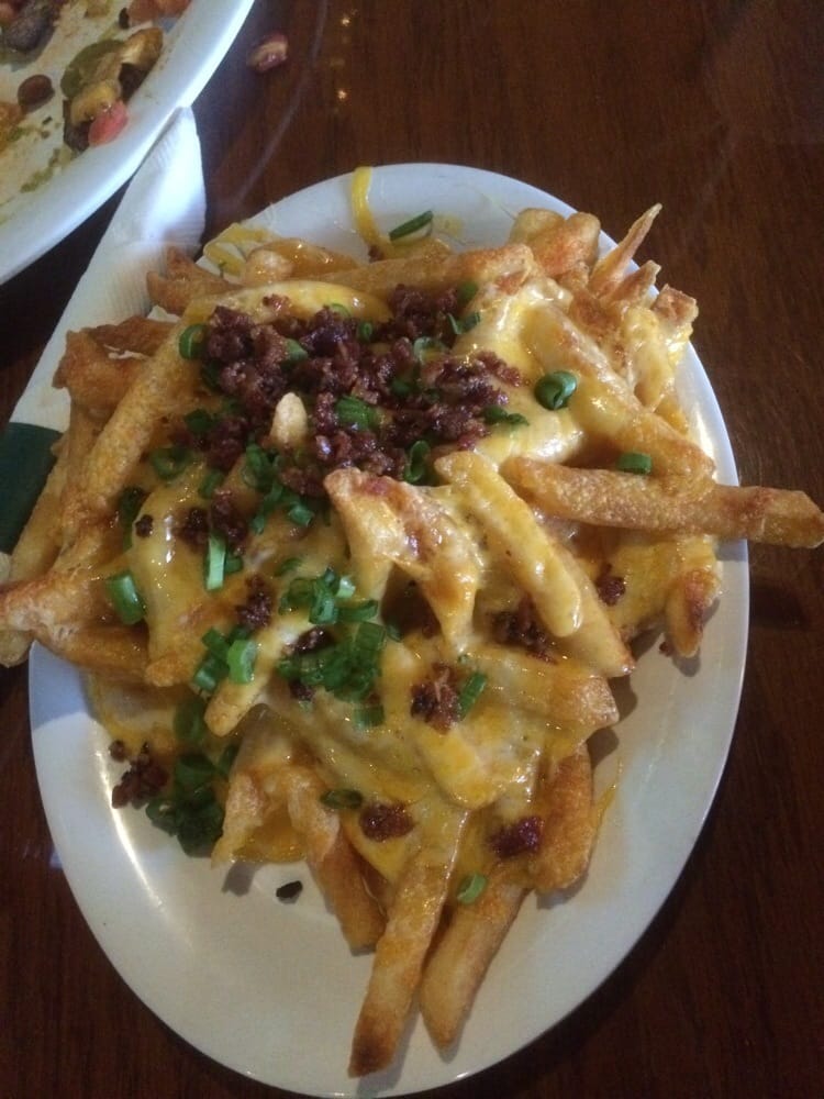 Order Loaded Fries food online from Village Tavern and Grill store, Carol Stream on bringmethat.com