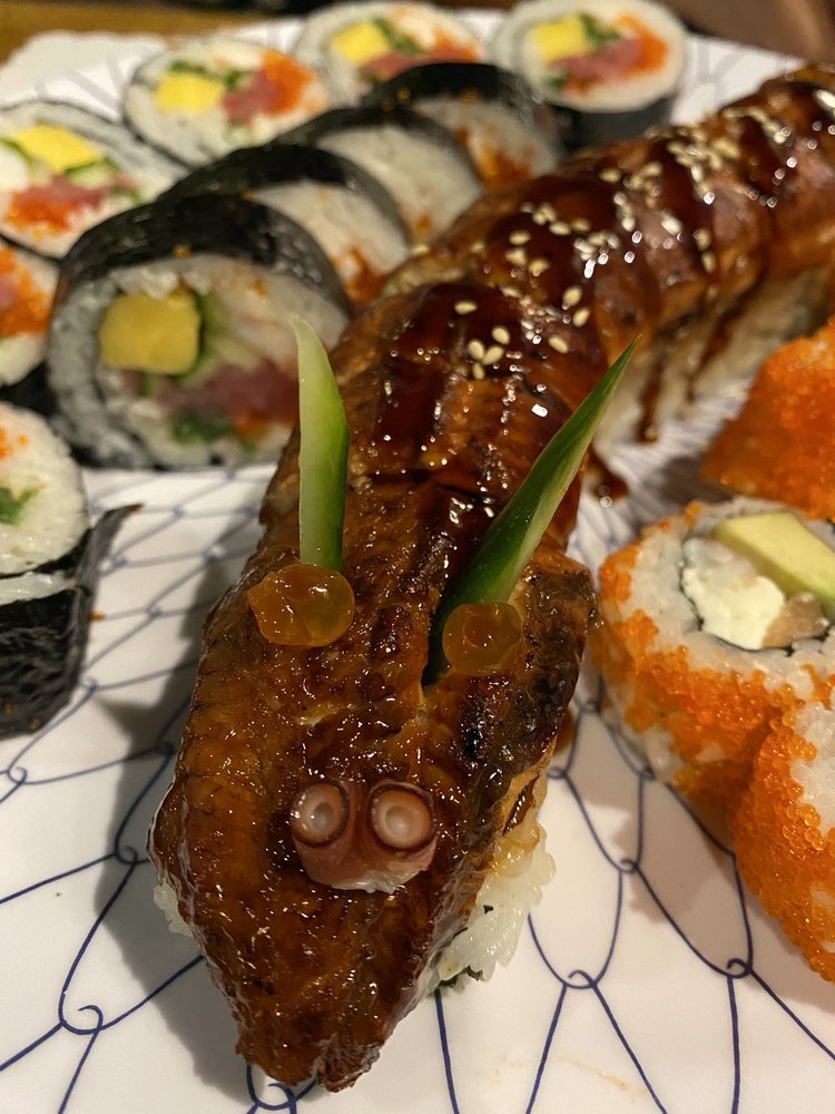 Order Dragon Roll (9 Piece) food online from Sakura Japanese Restaurant store, Indianapolis on bringmethat.com