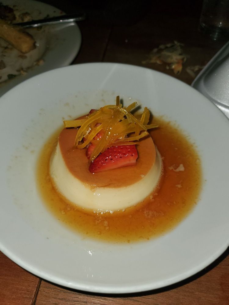 Order FLAN food online from Baru Bistro & Tapas store, New Orleans on bringmethat.com