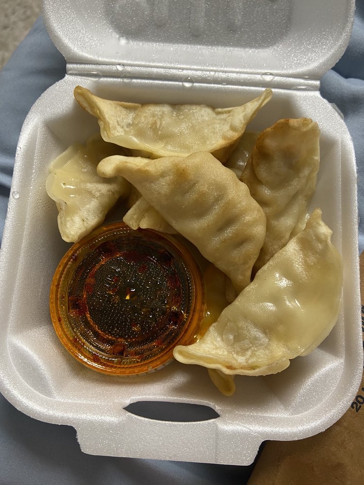 Order Steamed or Fried Dumplings (8) food online from China Food store, Baton Rouge on bringmethat.com
