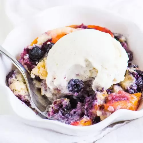 Order NEW!! Peach & Blueberry Cobbler food online from Vin 909 Winecafe store, Annapolis on bringmethat.com