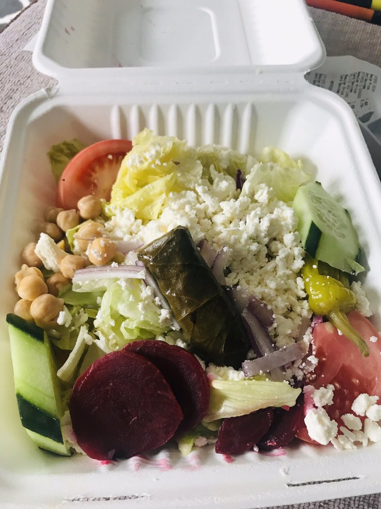 Order Greek Salad food online from Greek Village Restaurant store, Silver Spring on bringmethat.com
