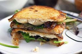 Order ROASTED CHICKEN & GOAT CHEESE PANINI food online from Cafe Bistro store, Novi on bringmethat.com