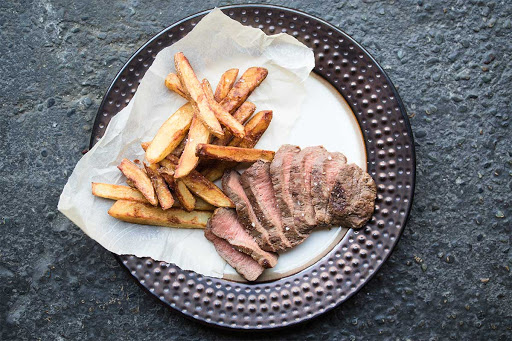 Order FLAT IRON STEAK FRITES  food online from Cafe Bistro store, Novi on bringmethat.com