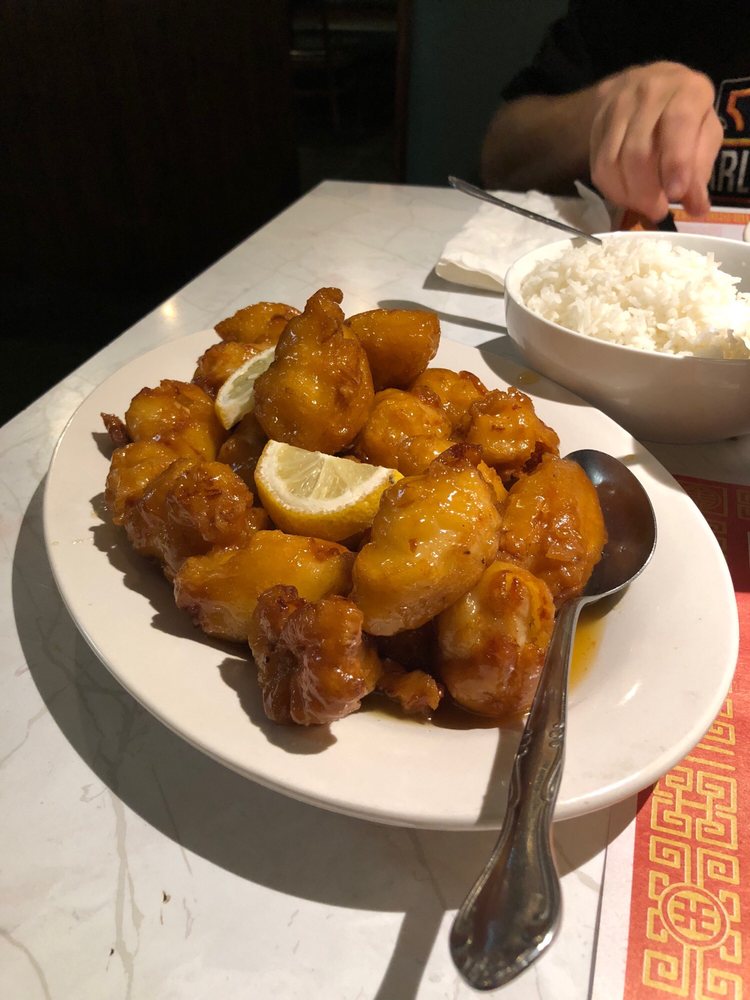 Order 26. Orange Chicken food online from Golden City Restaurant store, Madison Heights on bringmethat.com