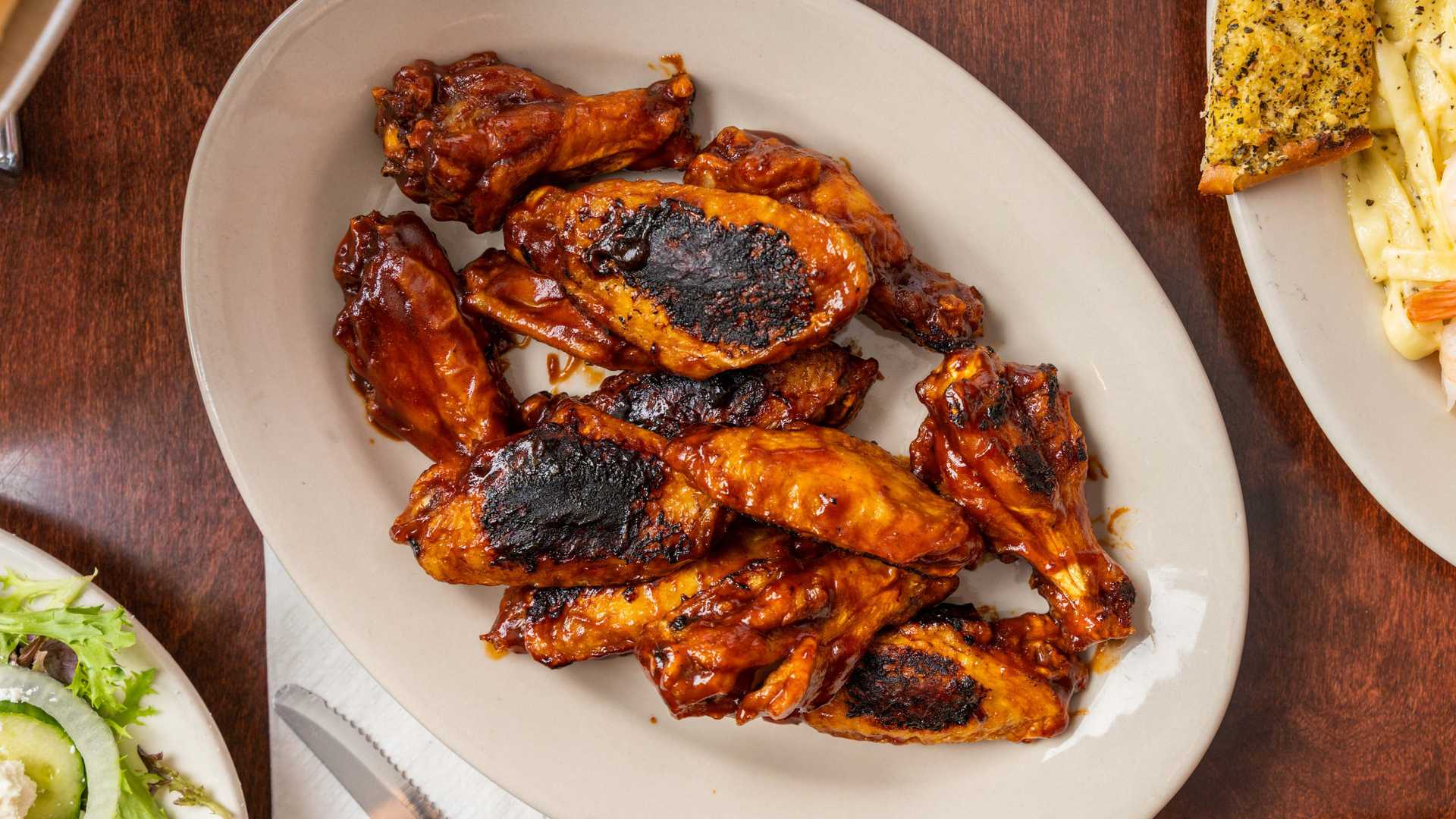 Order Wings food online from Brickhouse Tavern store, Newport News on bringmethat.com