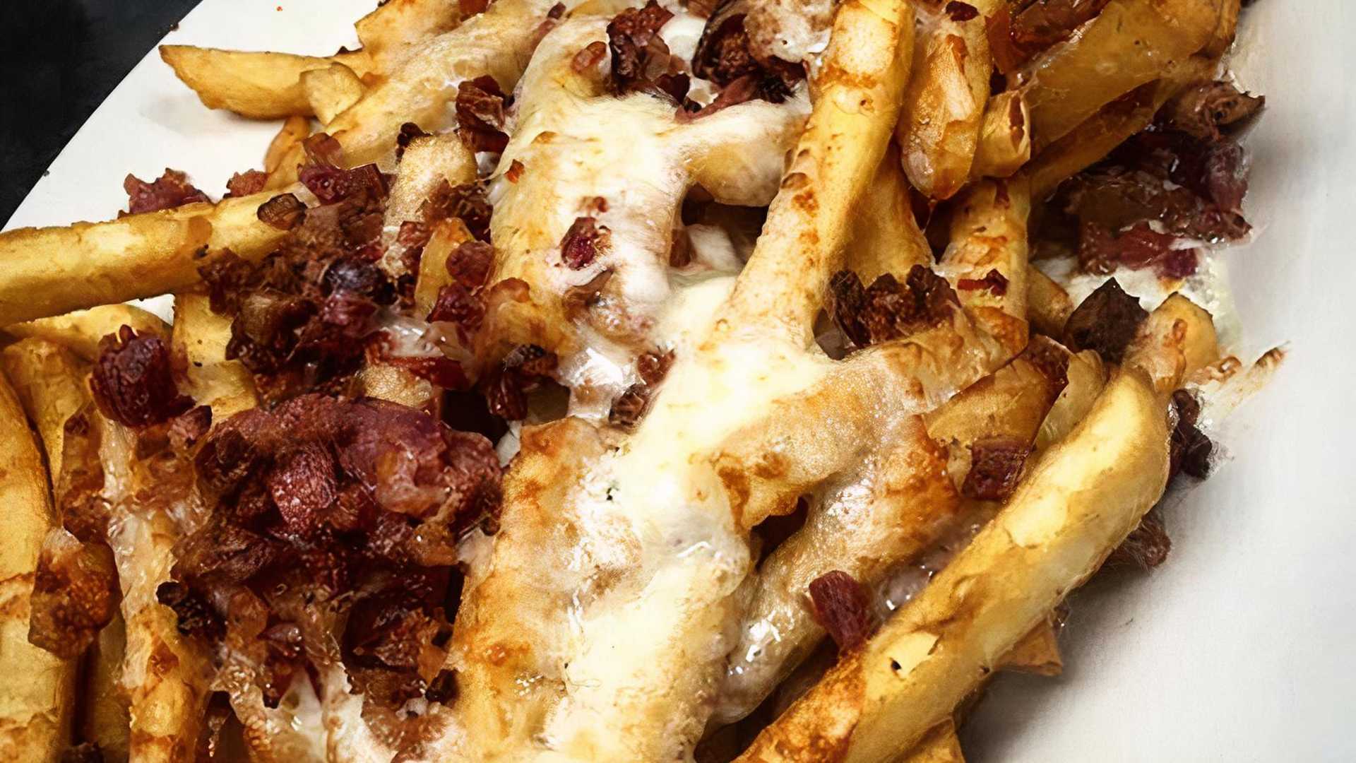 Order Basket Of Cheese Fries With Bacon food online from Brickhouse Tavern store, Newport News on bringmethat.com