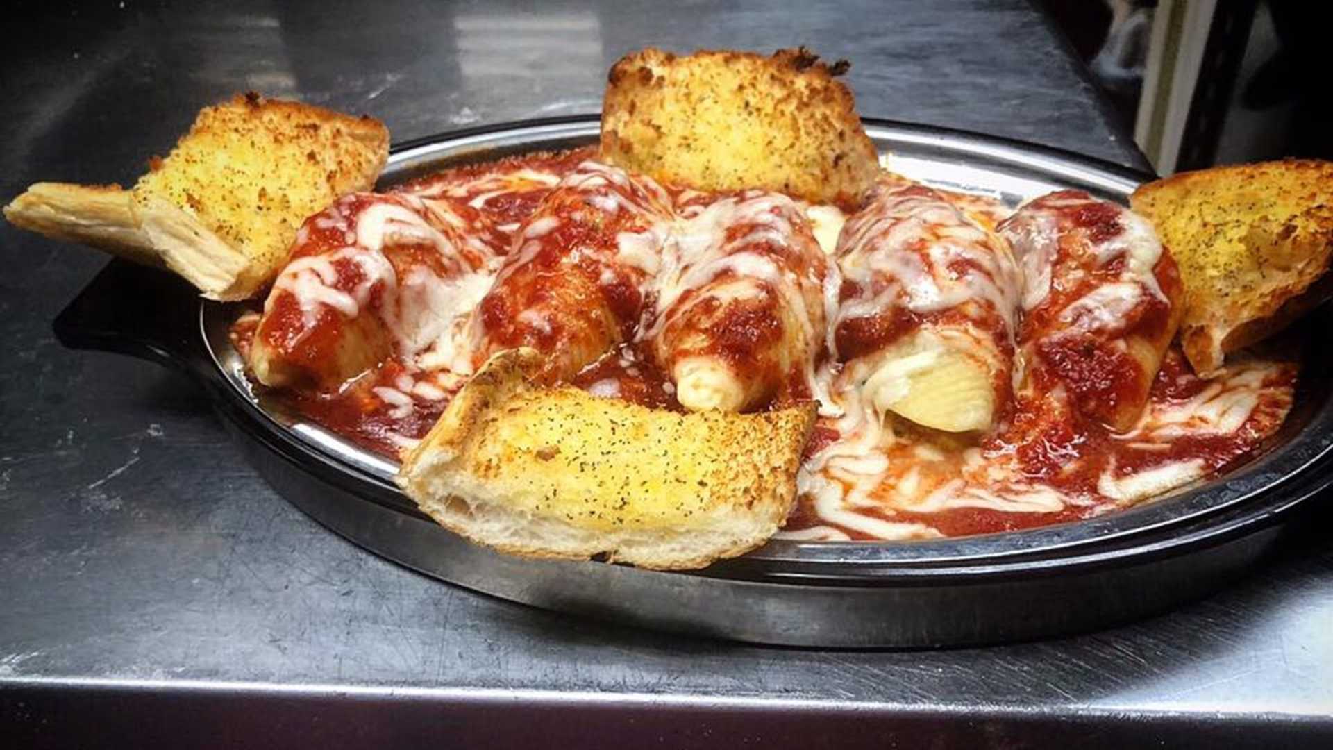 Order Manicotti food online from Brickhouse Tavern store, Newport News on bringmethat.com