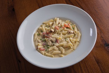 Order GF Penne Chicken Alfredo food online from Biaggi's store, Maple Grove on bringmethat.com