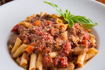 Order GF Penne Bolognese food online from Biaggi's store, Maple Grove on bringmethat.com