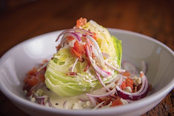 Order Wedge Salad food online from Biaggi's store, Maple Grove on bringmethat.com