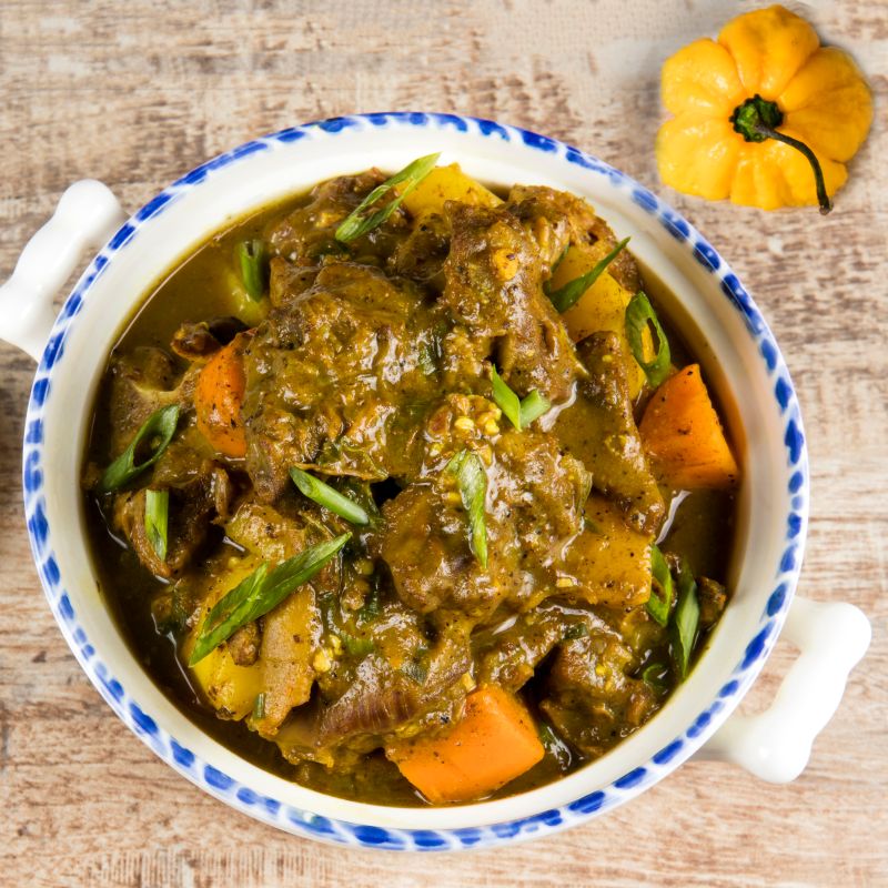 Order Curry Goat food online from Gs Jamaican Quisine store, Kansas City on bringmethat.com