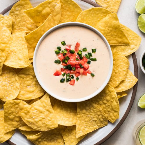 Order Queso Dip & Chips food online from Canyon Cafe store, Saint Louis on bringmethat.com