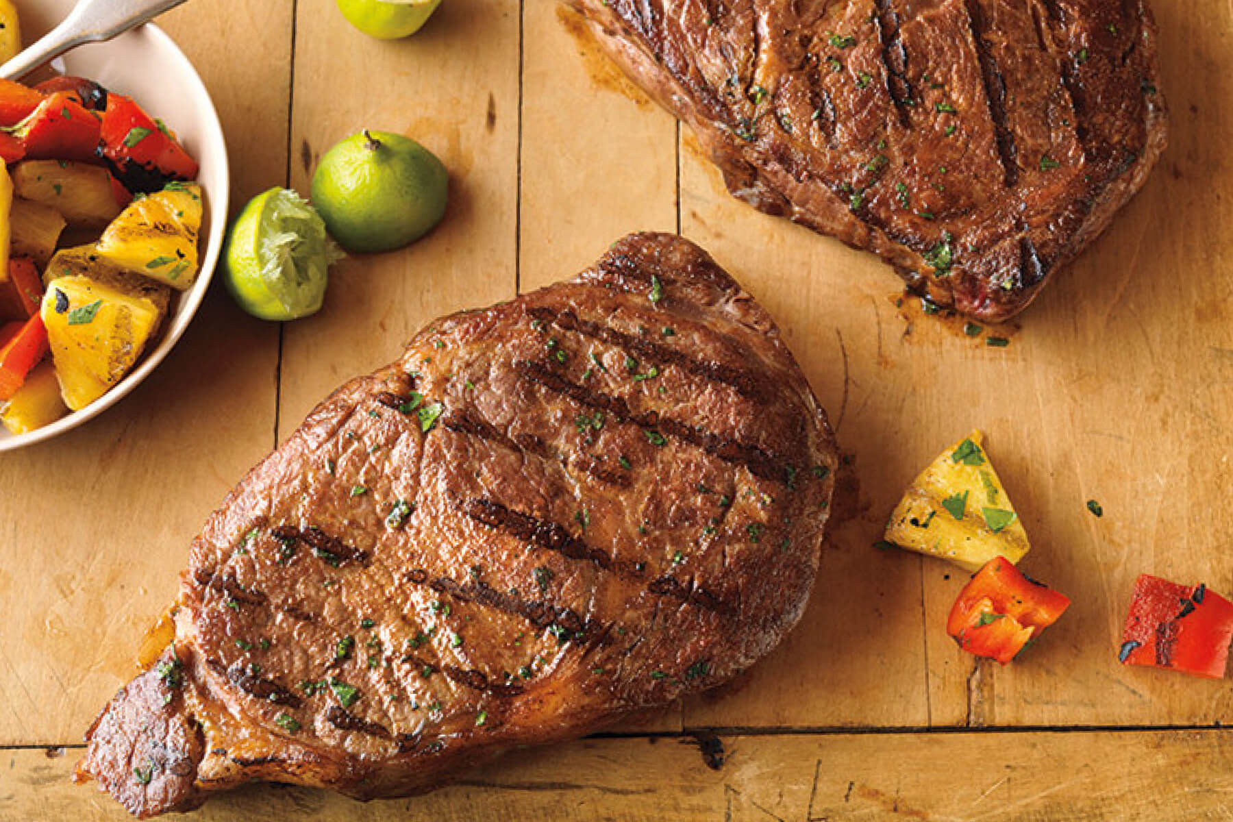 Order Caribbean Ribeye food online from Central Station Grill store, Starkville on bringmethat.com
