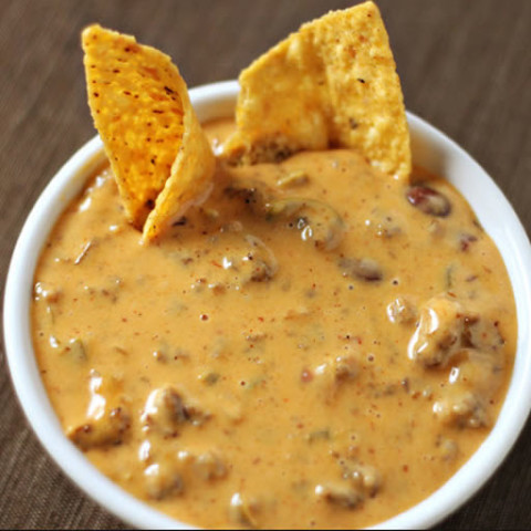 Order Queso Dip food online from Central Station Grill store, Starkville on bringmethat.com