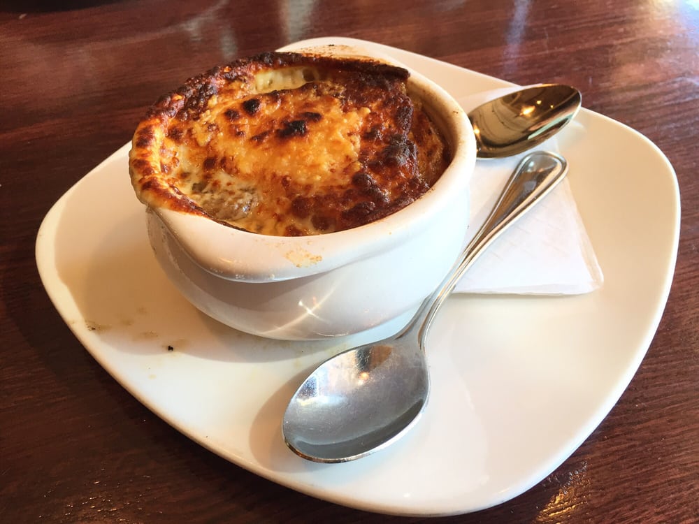 Order FRENCH ONION food online from Village Tavern store, Greensboro on bringmethat.com