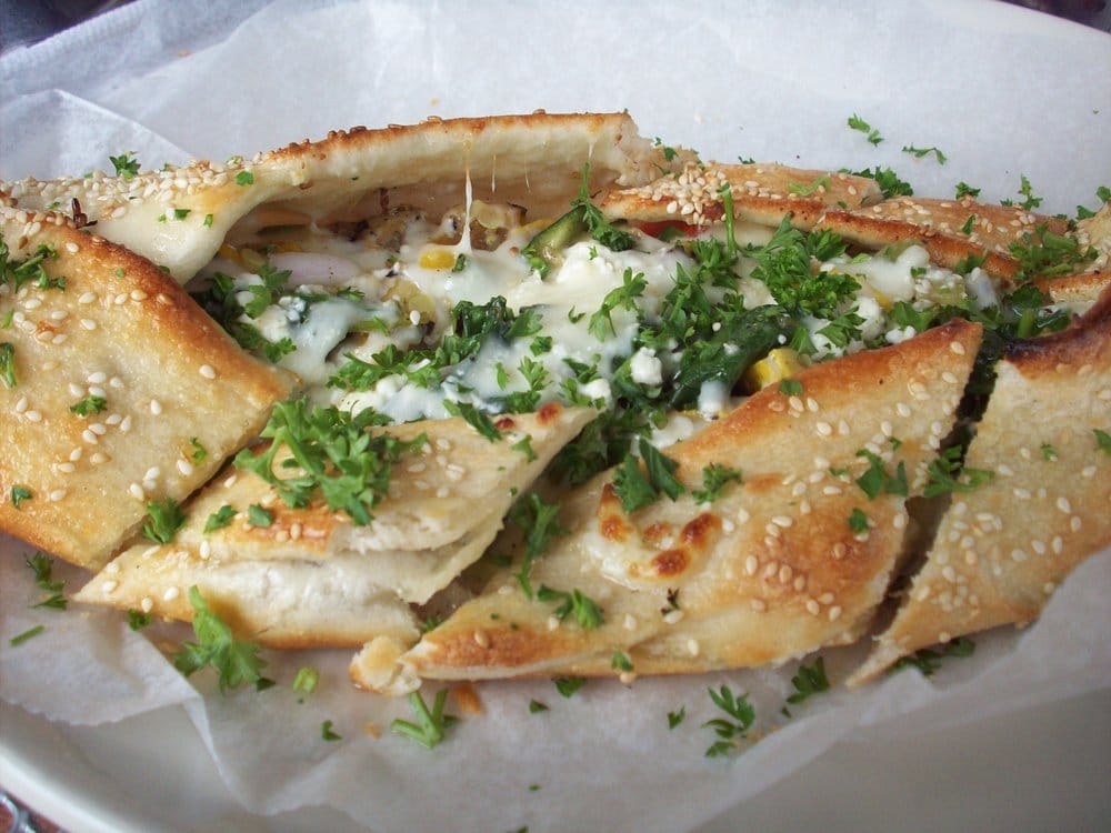 Order Veggie Fatayer food online from Mediterranean Deli, Bakery, and Catering store, Chapel Hill on bringmethat.com