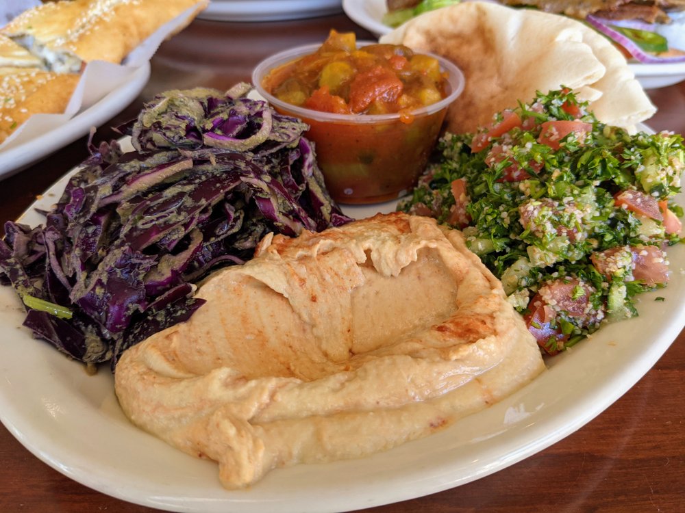 Order Hummus (All flavors) food online from Mediterranean Deli, Bakery, and Catering store, Chapel Hill on bringmethat.com