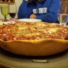 Order Stuffed Pizza food online from New Brother's Pizza store, Fishersville on bringmethat.com