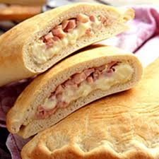 Order Ham & Cheese Calzone (Large) food online from New Brother's Pizza store, Fishersville on bringmethat.com