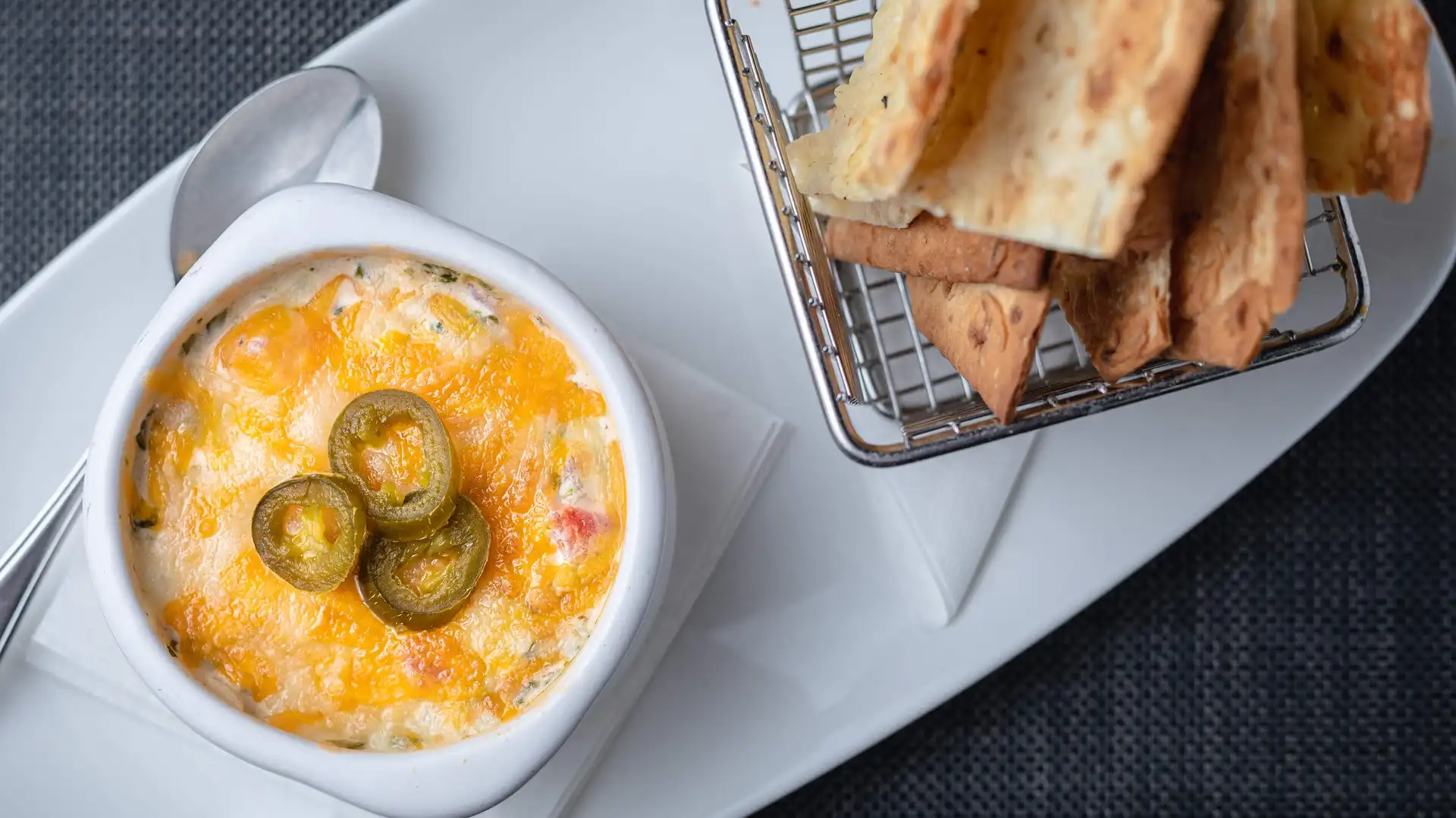 Order Spinach Tortilla Dip food online from Village Tavern store, Winston Salem on bringmethat.com