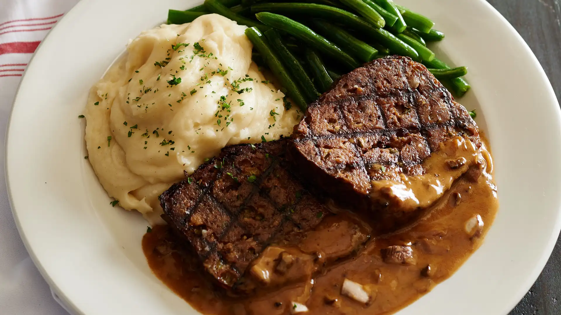Order Grilled Meatloaf food online from Village Tavern store, Winston Salem on bringmethat.com