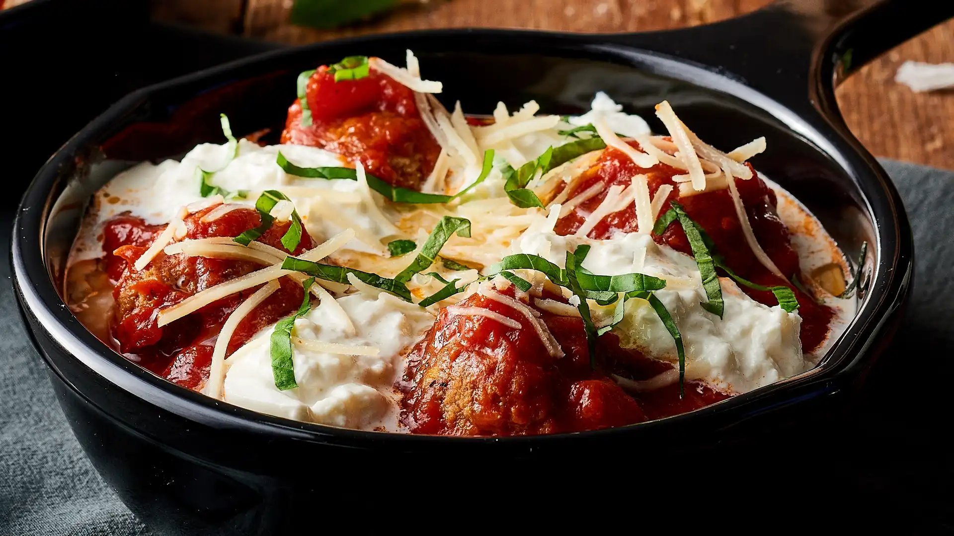 Order Braised Meatball Skillet food online from Village Tavern store, Winston Salem on bringmethat.com