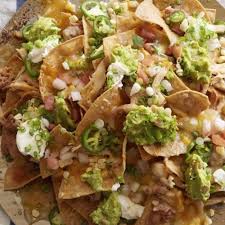 Order BBQ Nachos food online from Famous Dave's store, Fargo on bringmethat.com