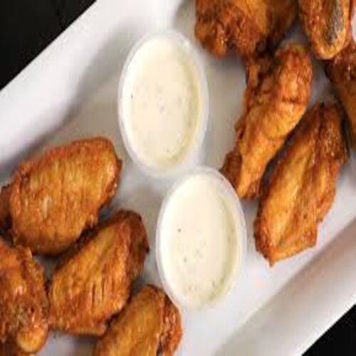 Order Traditional Wings | Basket food online from Famous Dave's store, Fargo on bringmethat.com