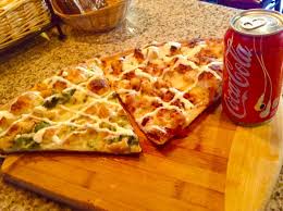 Order 2 Slices of Gourmet & Can of Soda food online from La Piazza Pizza & Italian Restaurant store, Grasonville on bringmethat.com