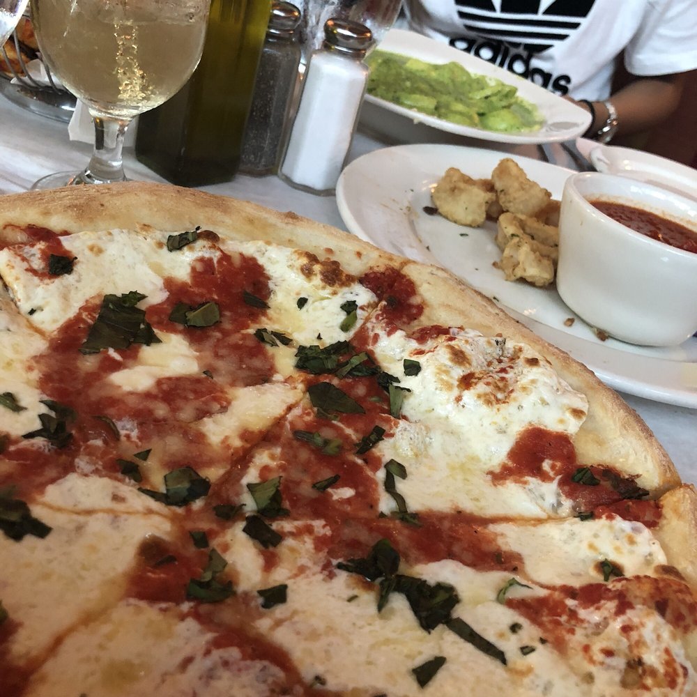 Order Pizza Margherita food online from Cafe Baci store, Westbury on bringmethat.com