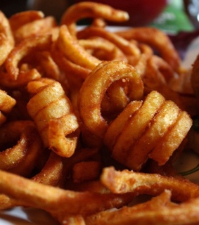 Order Curly Fries food online from Town Tavern store, Erin on bringmethat.com