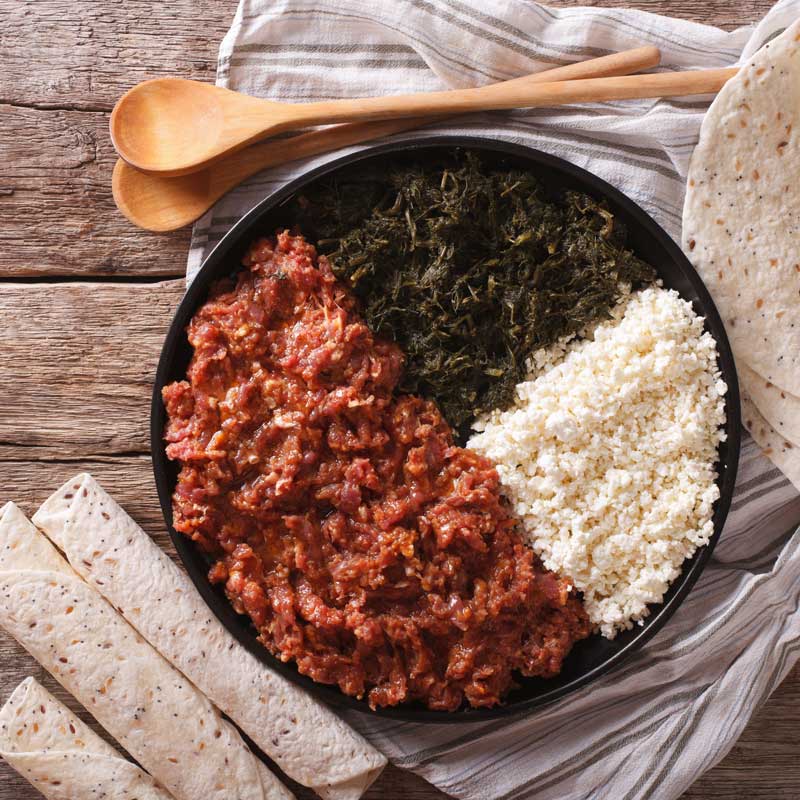 Order Kitfo food online from E'Njoni Cafe store, Portland on bringmethat.com