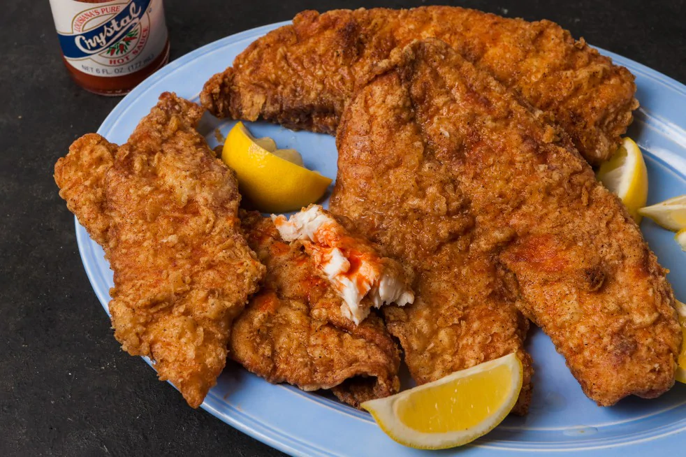 Order Fried Tilapia Fillet food online from E'Njoni Cafe store, Portland on bringmethat.com