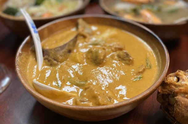 Order KareKare Beef food online from Tambayan Restaurant & Mart store, Portland on bringmethat.com