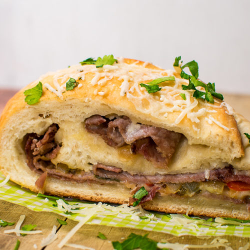 Order Steak and Cheese Stromboli (Small 12") food online from Backdraft Restaurant store, Lake Ariel on bringmethat.com